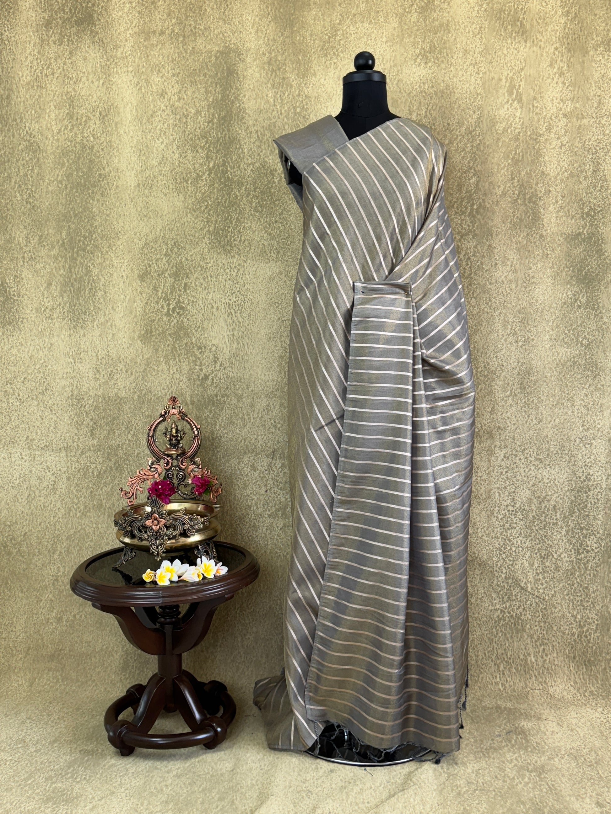 Light Grey Shade Tissue Saree with Gold Strips